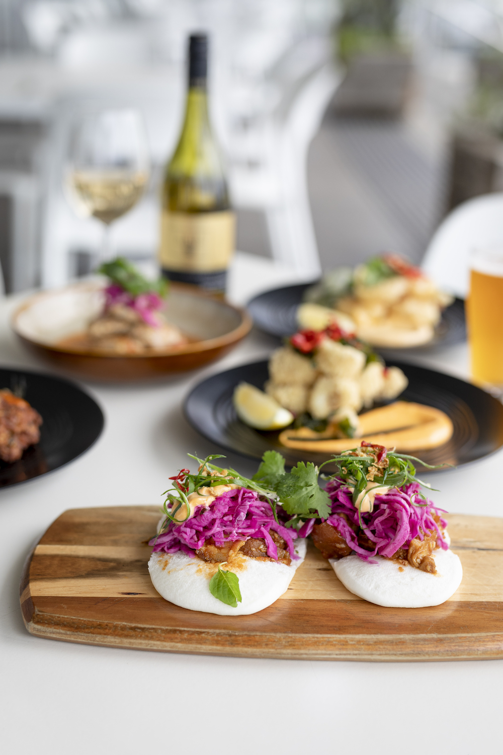 Entree duo of Thai duck bao buns